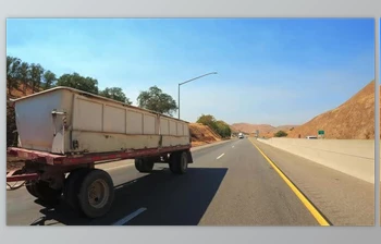 Download Passing a double trailer freightliner truck on a highway in slow <span class='badge badge-warning'>motion</span> (Videohive 45911552)