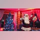 Download Funny Santa with Christmas lights dancing in the house. (Videohive 46140417)